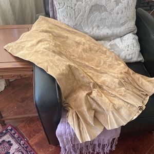 Elegant suede mid-calf length skirt in a neutral beige. Size 1.